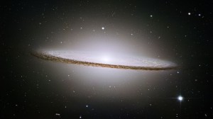 ngc 4594,m104,unbarred spiral galaxy,giant elliptical galaxy