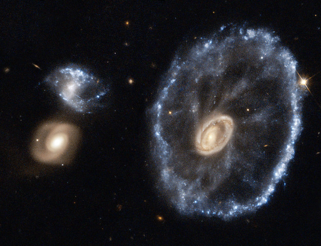 ring galaxy,lenticular galaxy,sculptor,colliding galaxies