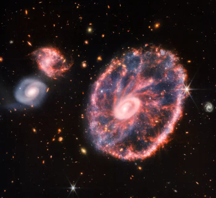 cartwheel galaxy,ESO 350-40,cartwheel ring galaxy,cartwheel galaxy james webb telescope