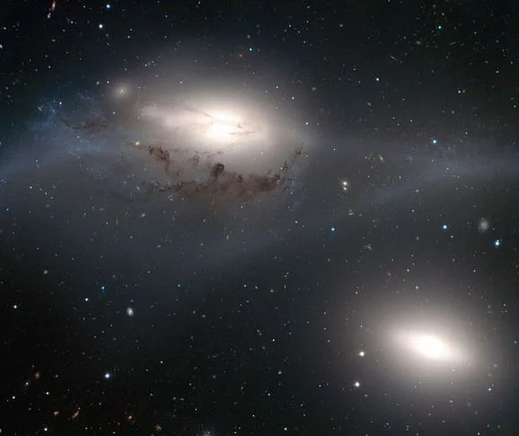 NGC 4438 and NGC 4435,interacting galaxies,colliding galaxies