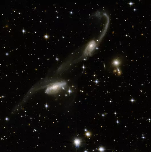 interacting galaxies in triangulum australe