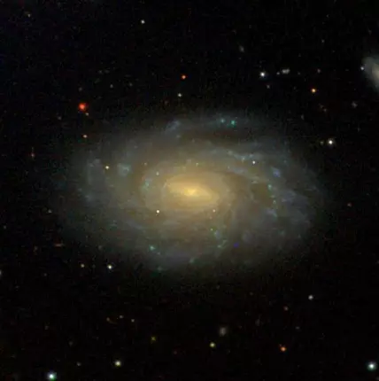 barred spiral galaxy in serpens