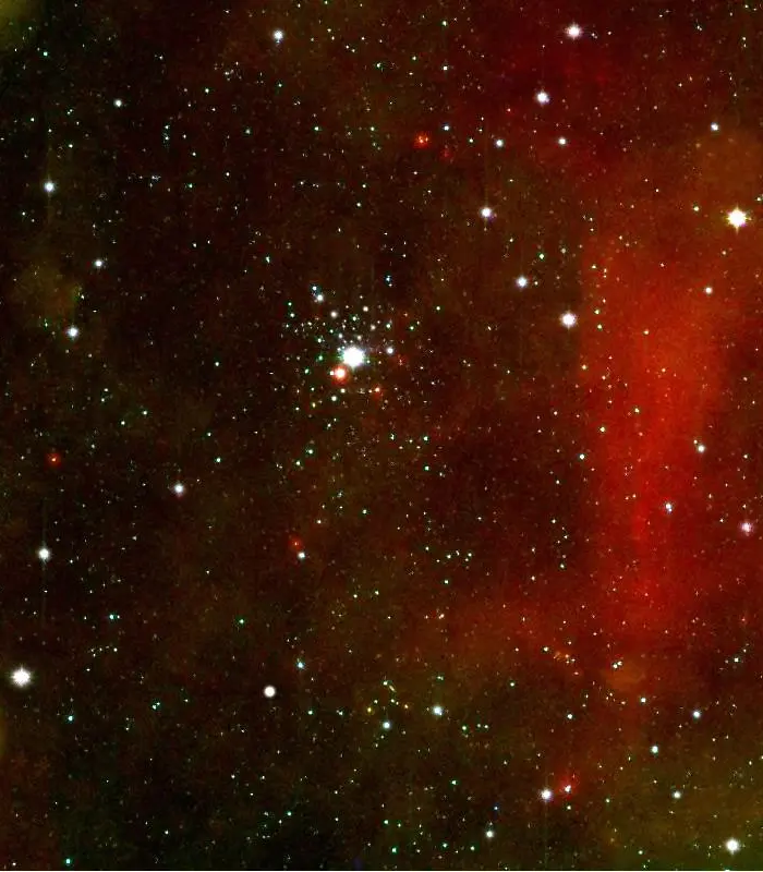 tau canis majoris cluster by the spitzer space telescope
