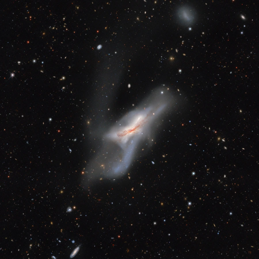 flying ghost galaxy,ngc 520 noirlab